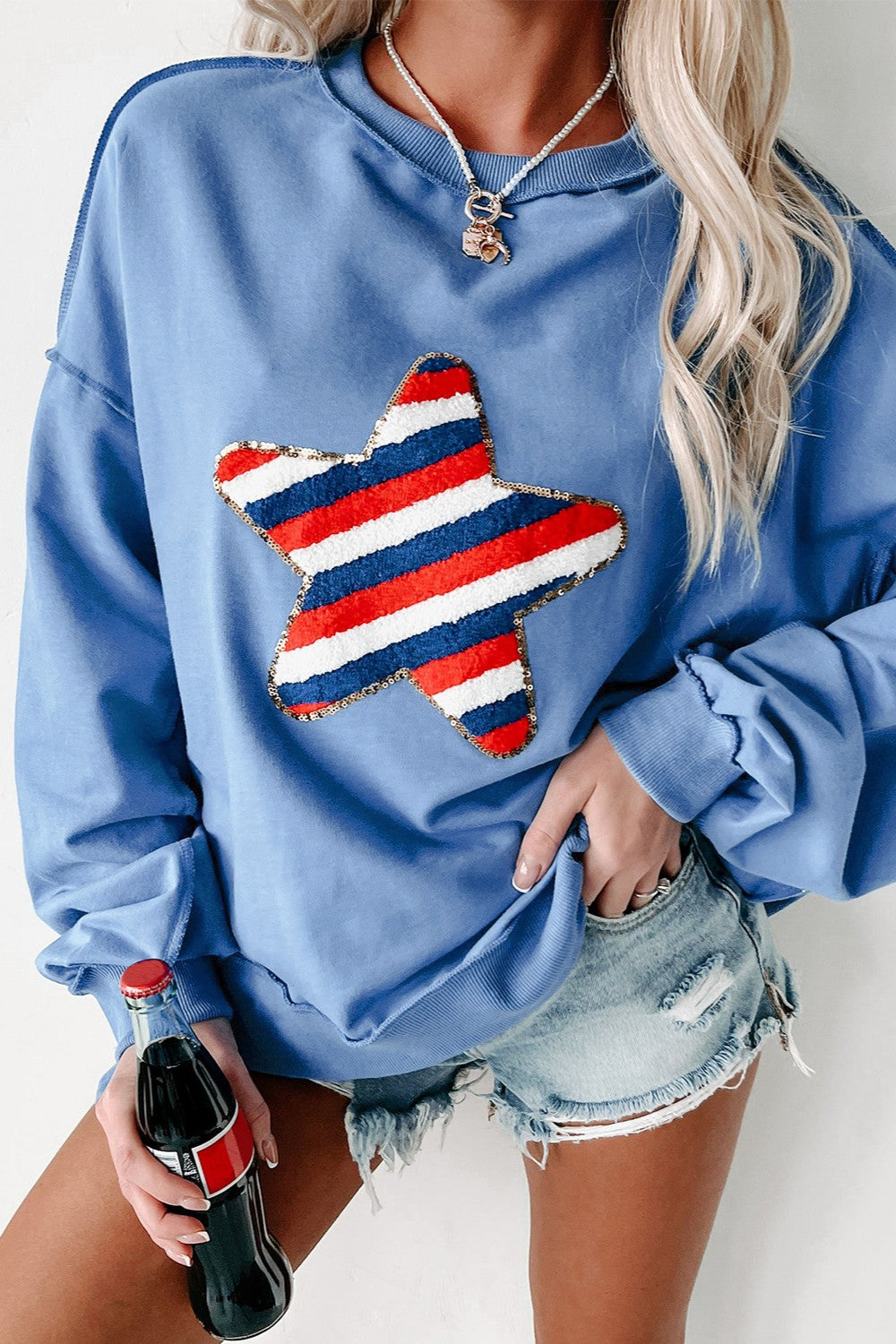 Exposed Seam Star Long Sleeve Sweatshirt