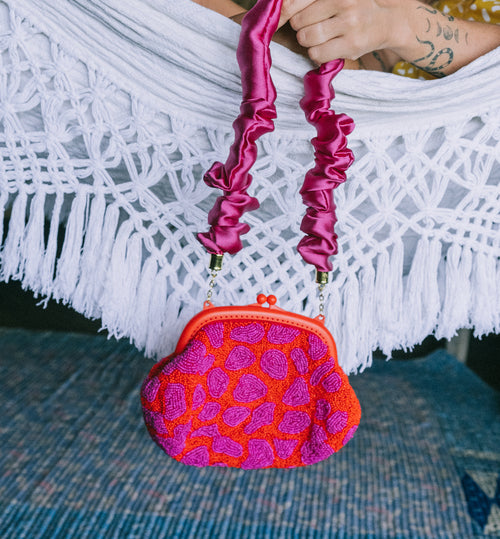 ARNOLDI JEAN Hand-beaded Clutch, in Red & Pink